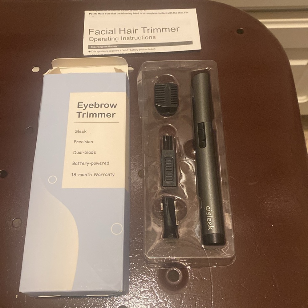 NEW. Eyebrow Trimmer. Black & Sleek